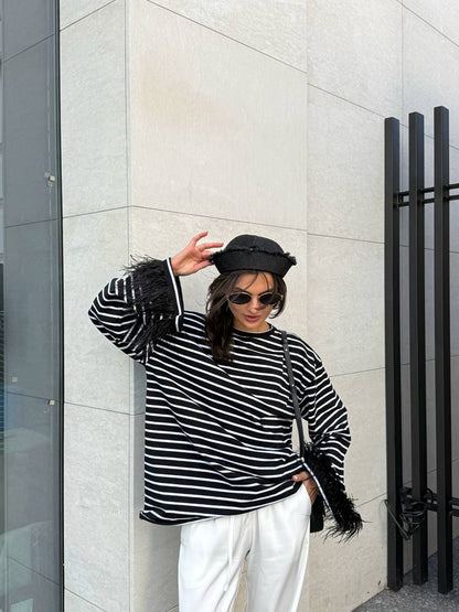 Лонгслів з натуральним страусиним пірʼям